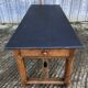 Antique oak farmhouse table with cat bar and 2 end drawers