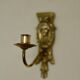 Pair of mid-century Swedish brass face motif sconces