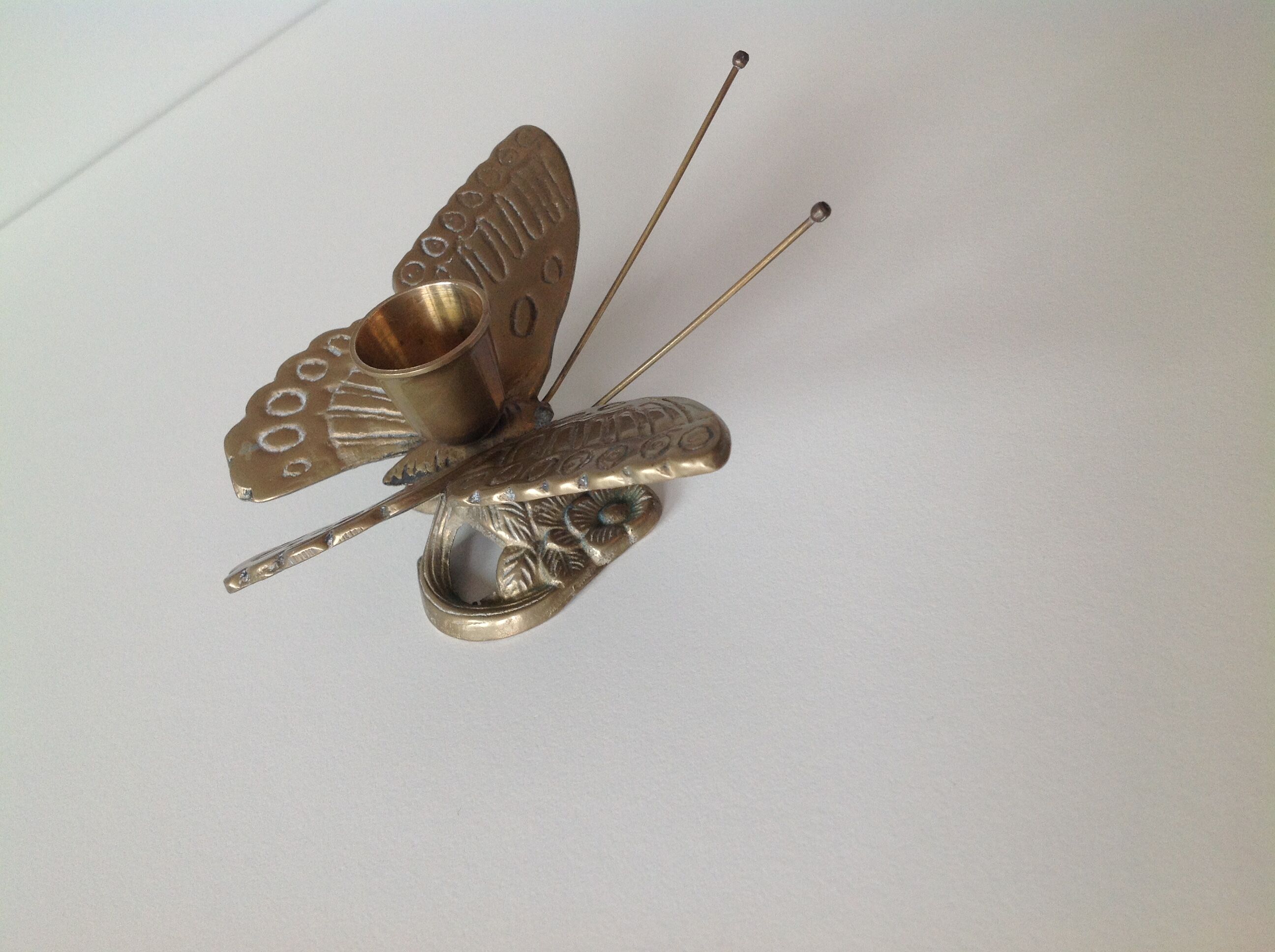 Brass butterfly candlestick