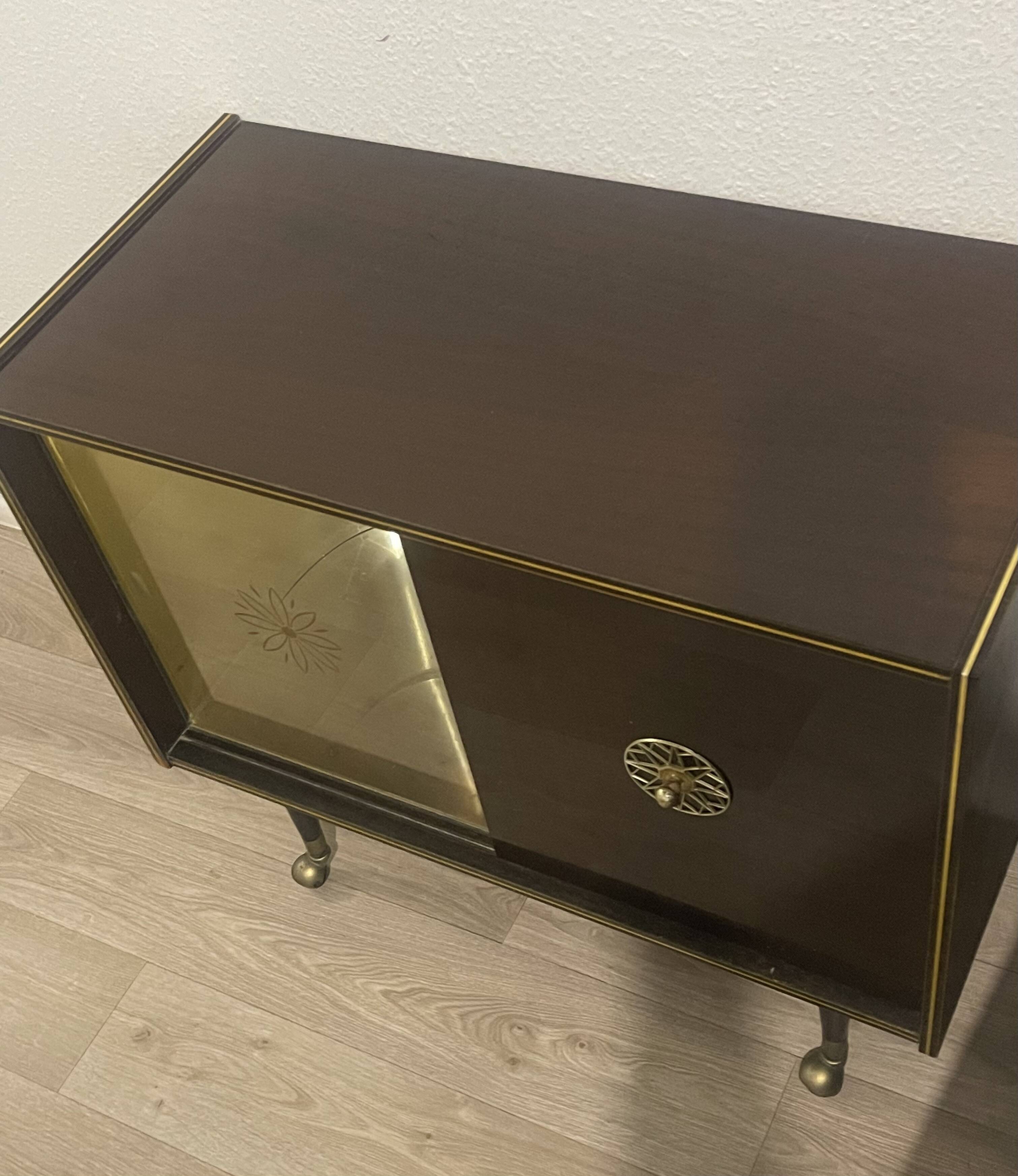 Wood and brass bar cabinet, 1950s.