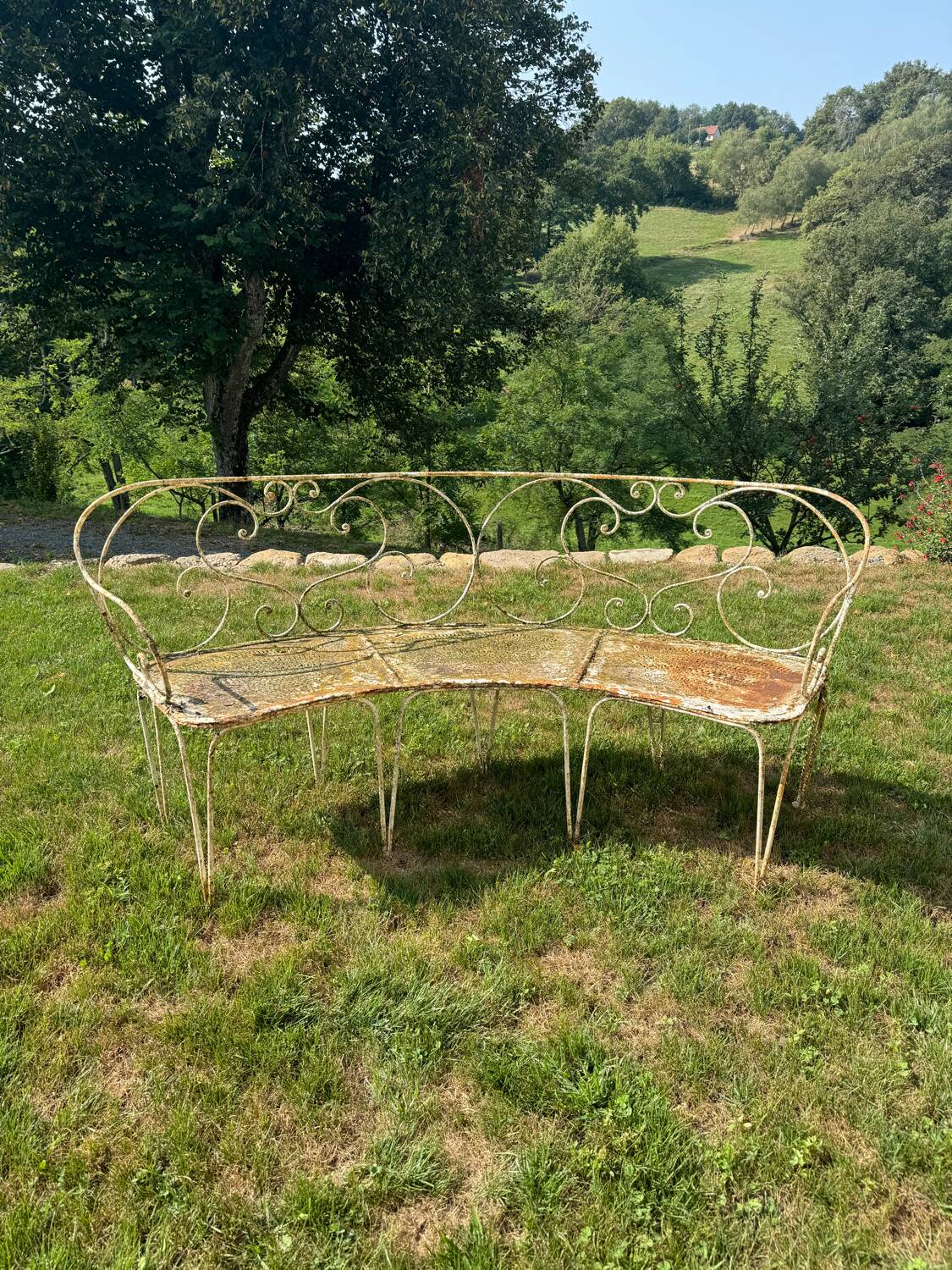 Wrought iron half-moon bench