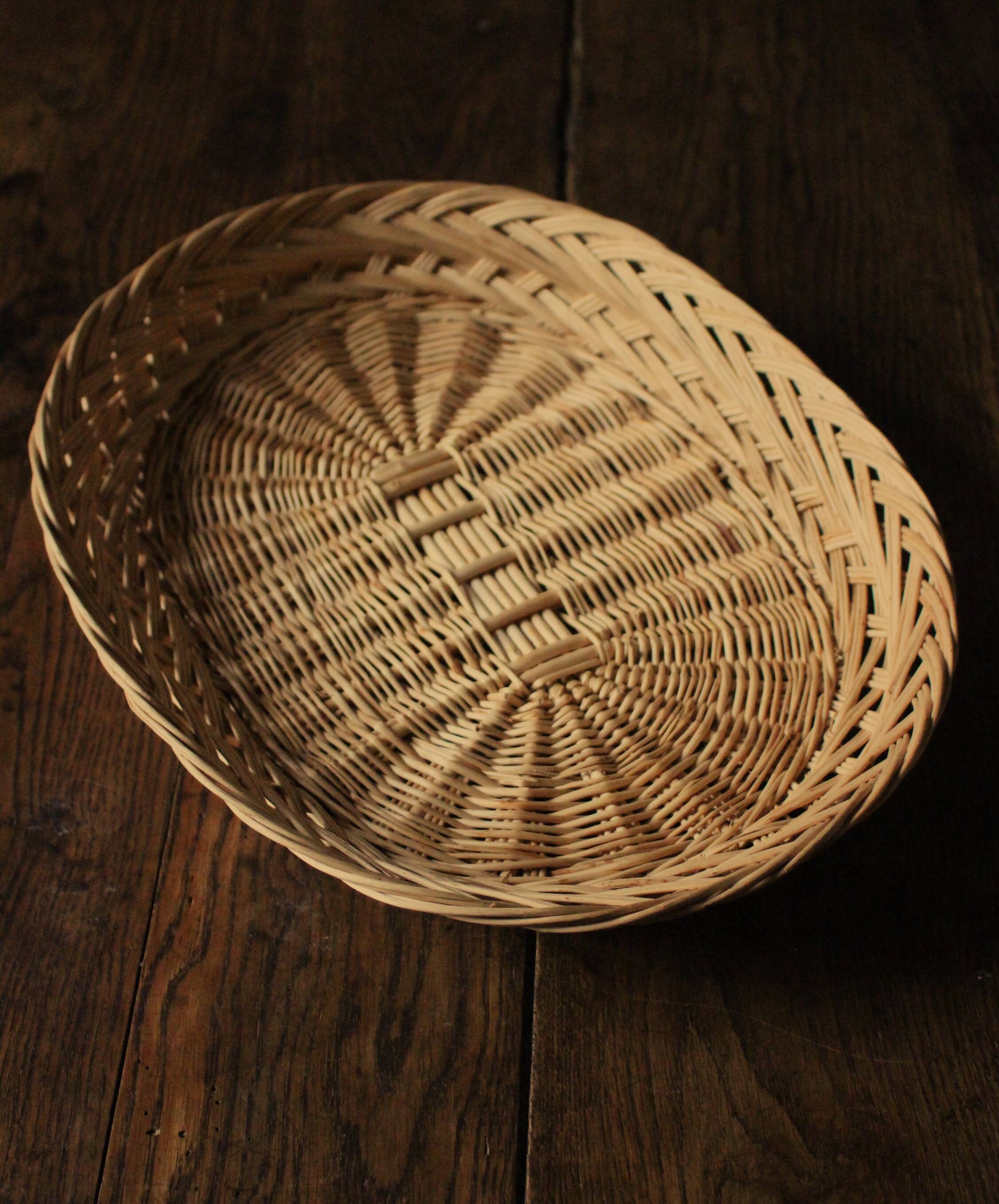 Basket oval base light wicker border vintage basketry