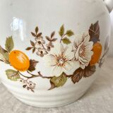 Vintage porcelain and rattan teapot