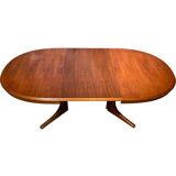 Baumann style wooden table with extensions.