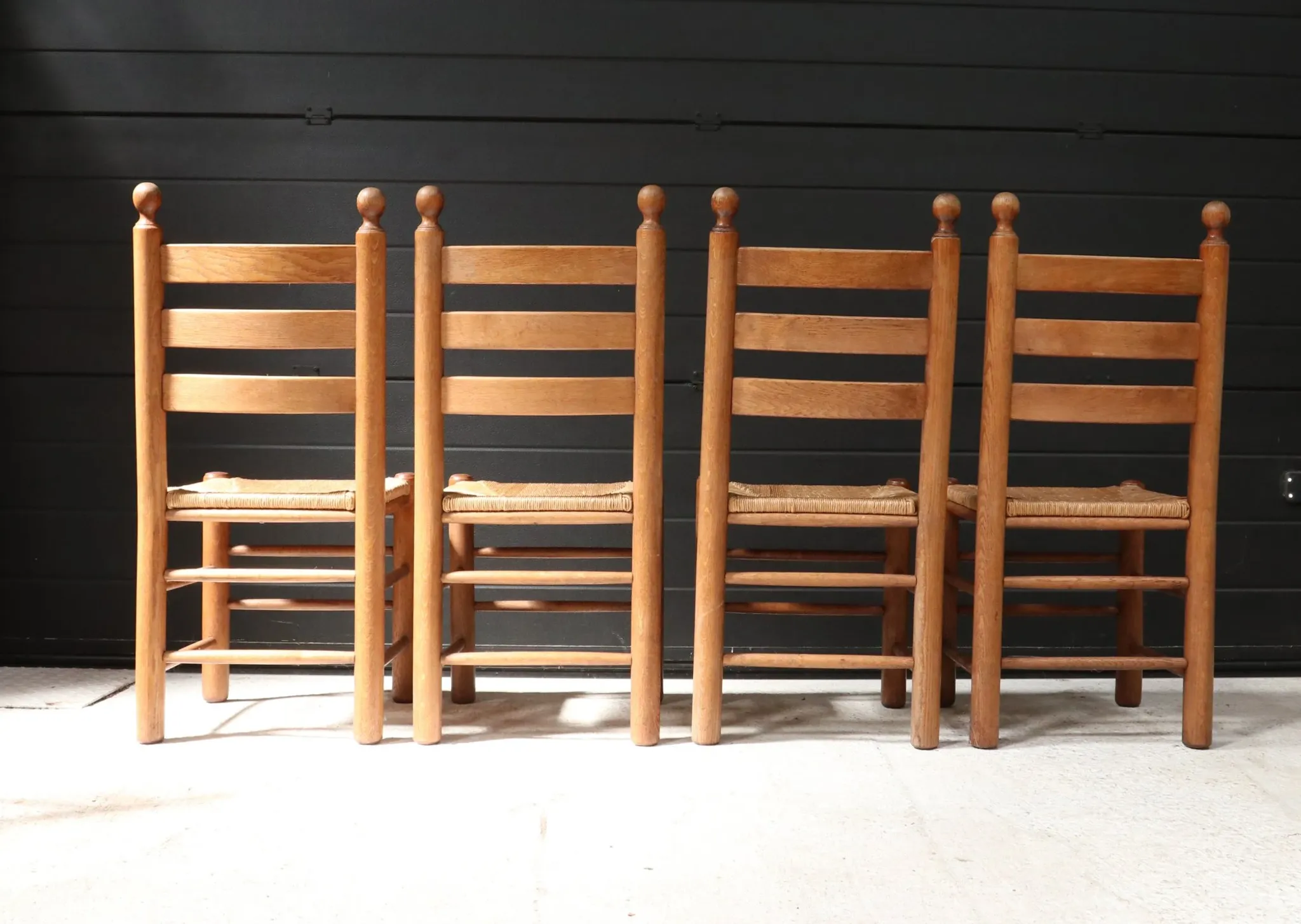 Set of four French ladderback chairs with rush seats – circa 1960