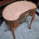 Louis XV style bean desk in marquetry and gilded bronze