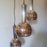 Raak orange three-light space age pendant light, 1970s Netherlands