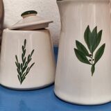 White ceramic pot and mini pitcher with bay leaf illustration