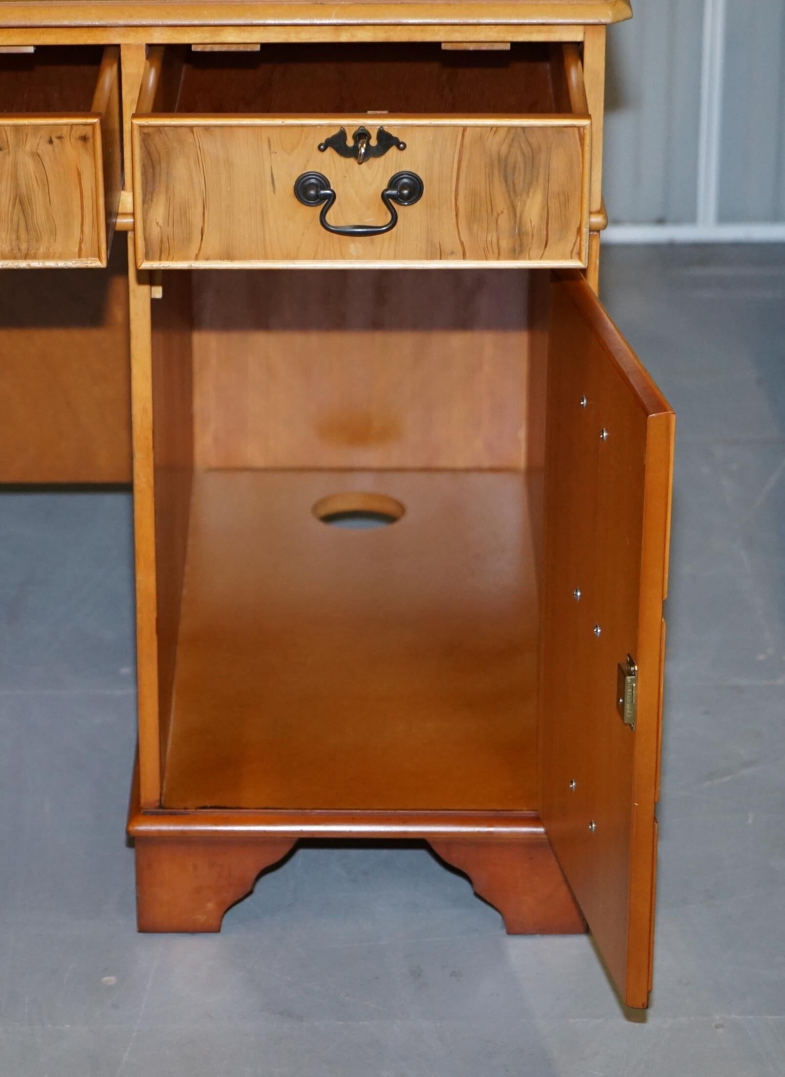 Vintage satin wood partner desk with leather top.