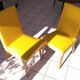 Pair of yellow chairs skaï yellow 60s