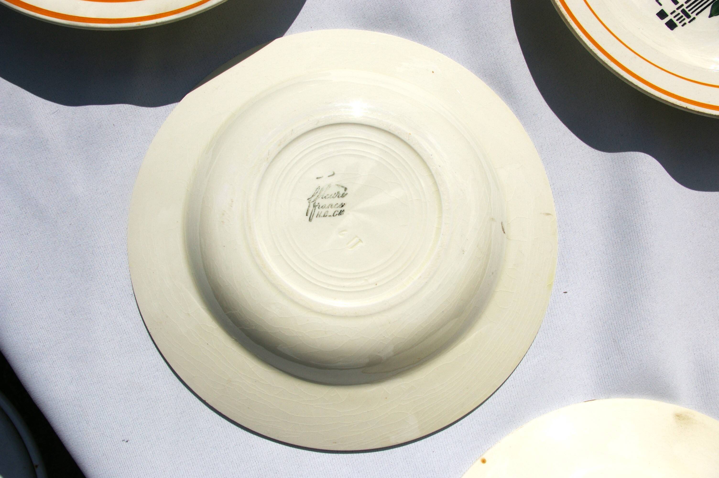 10 HB Creil Montereau earthenware soup plates, "Fleuri" model