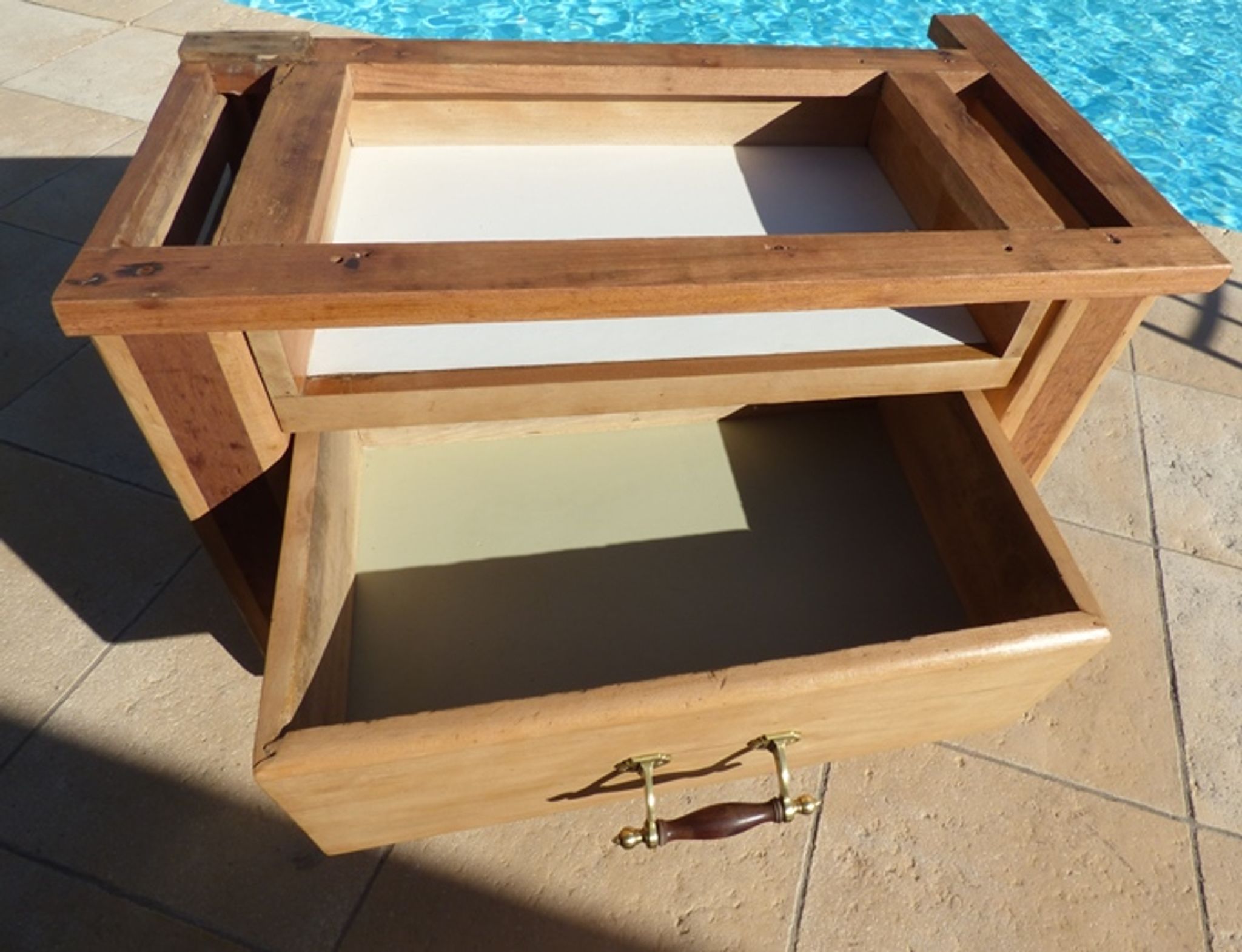 Butcher's log cabinet with two drawers and location for kitchen utensils