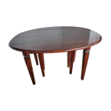 Oval wooden table with 3 extensions