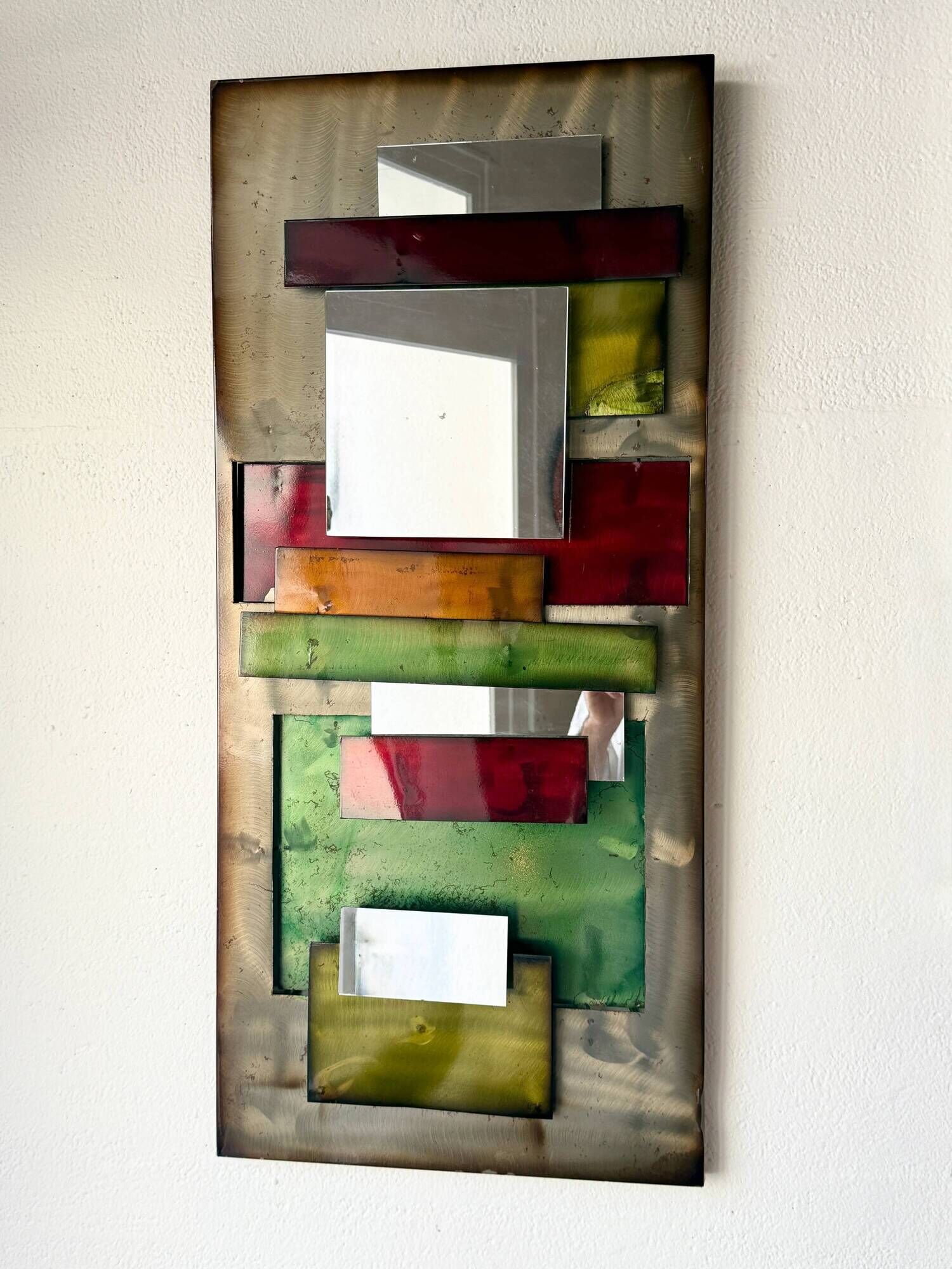 Large metal "polychrome" mirror — 1970s