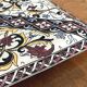 Vintage trivet in Gien earthenware with cornflower decoration.