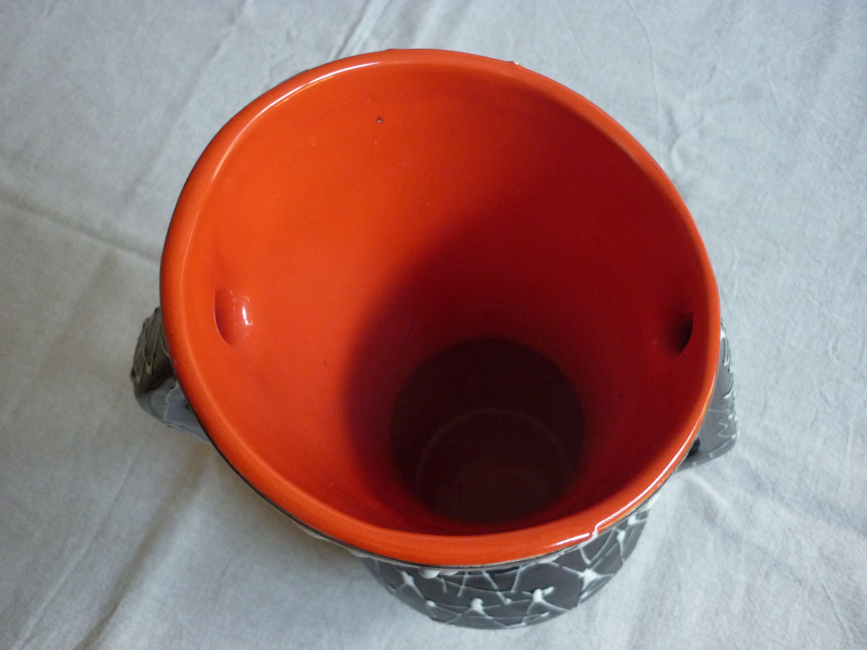 Vintage dark streaked white interior red vase