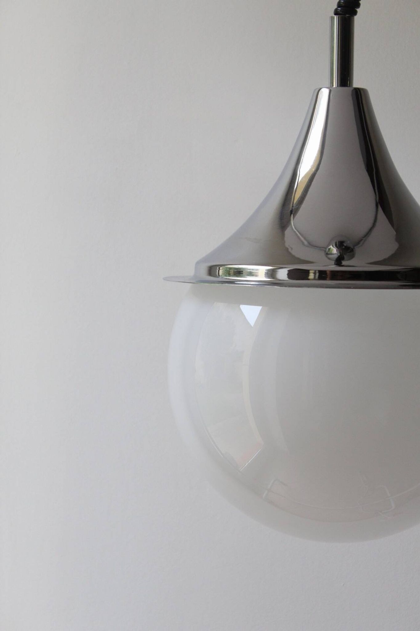 Space age glass and chrome ball suspension