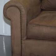 Ralph Lauren Jamaica velvet sofa pair with feather cushions.