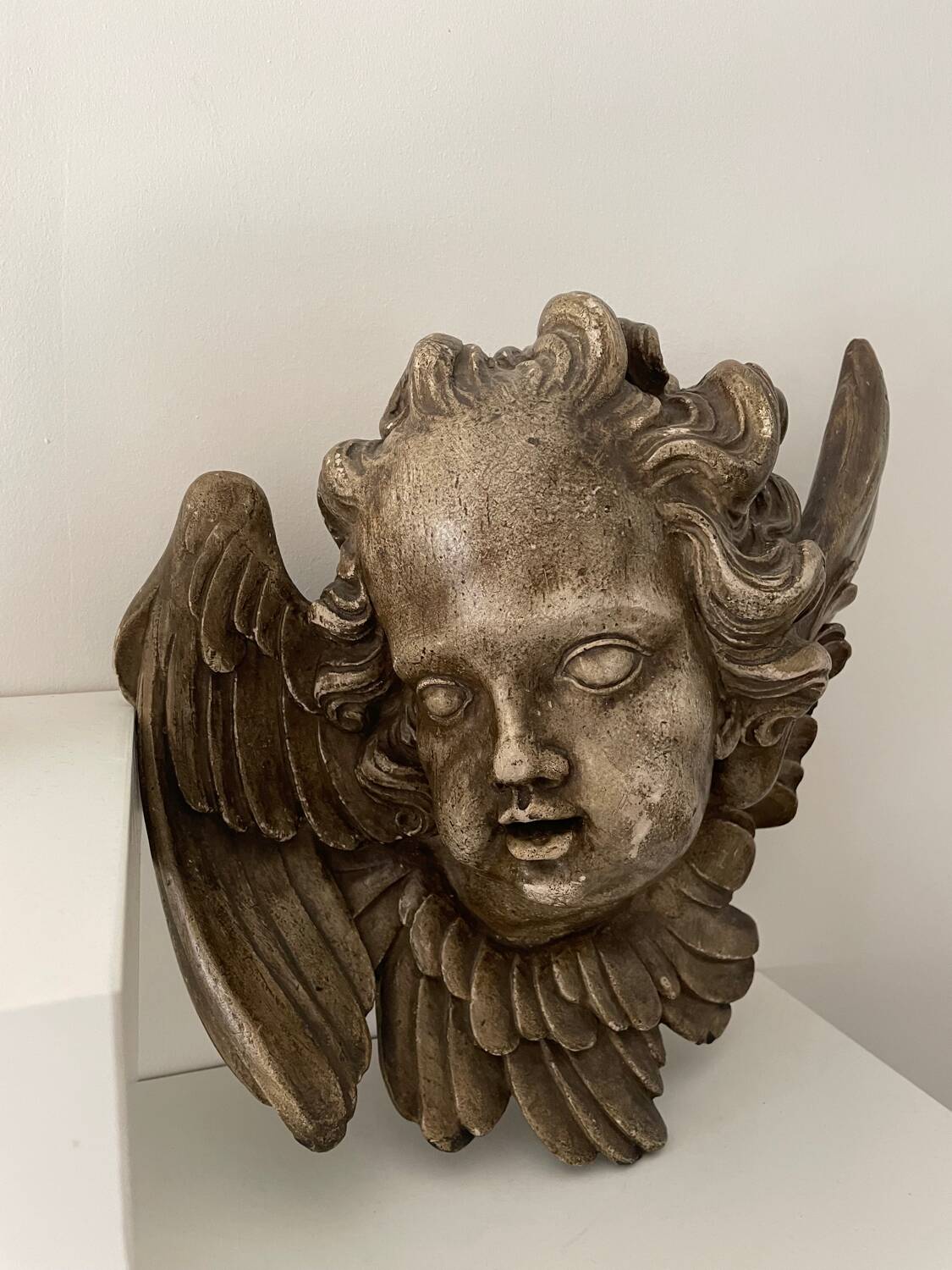 Old plaster angel head