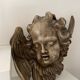 Old plaster angel head