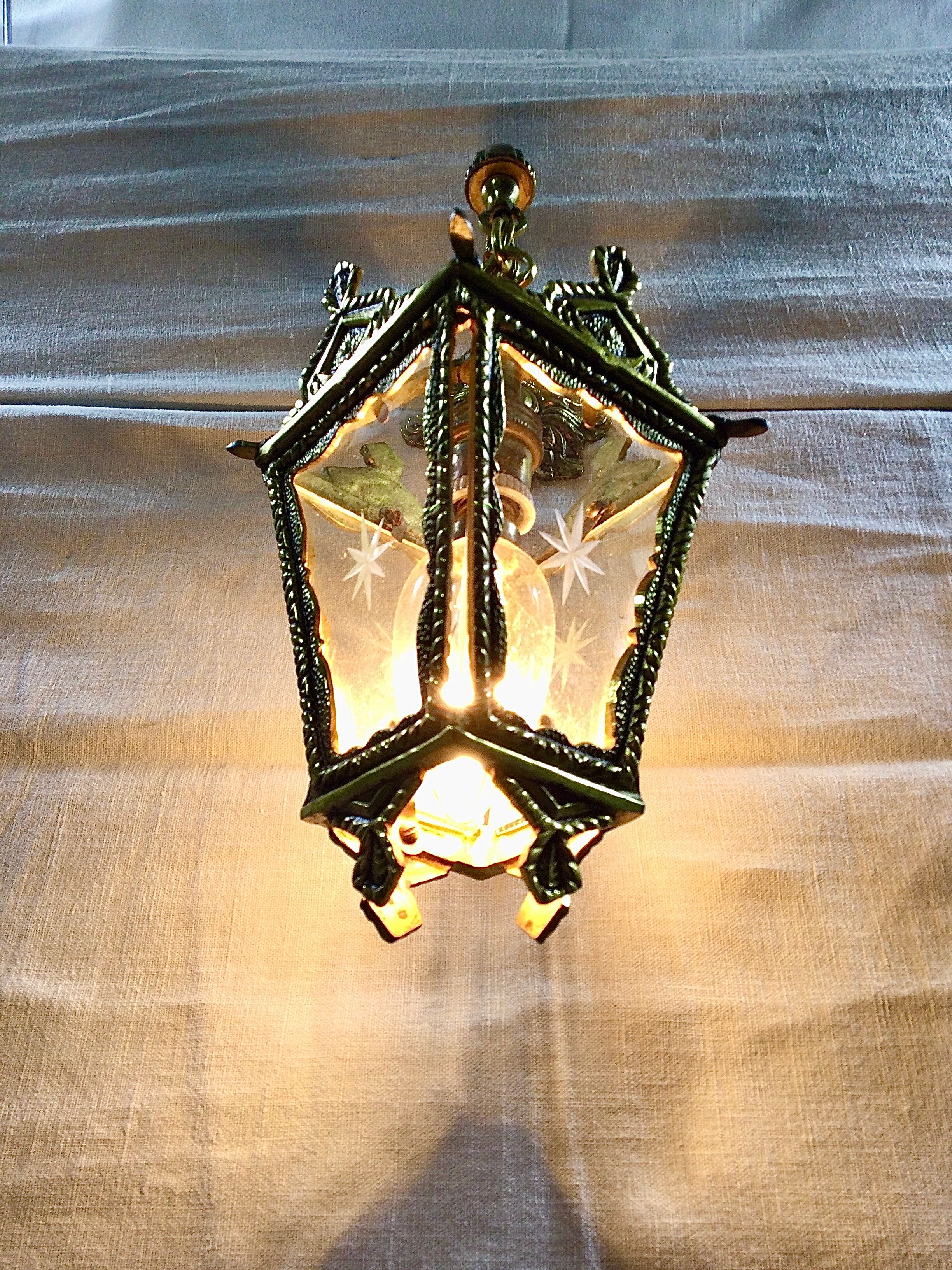 Bronze lantern with starry glasses