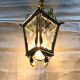 Bronze lantern with starry glasses