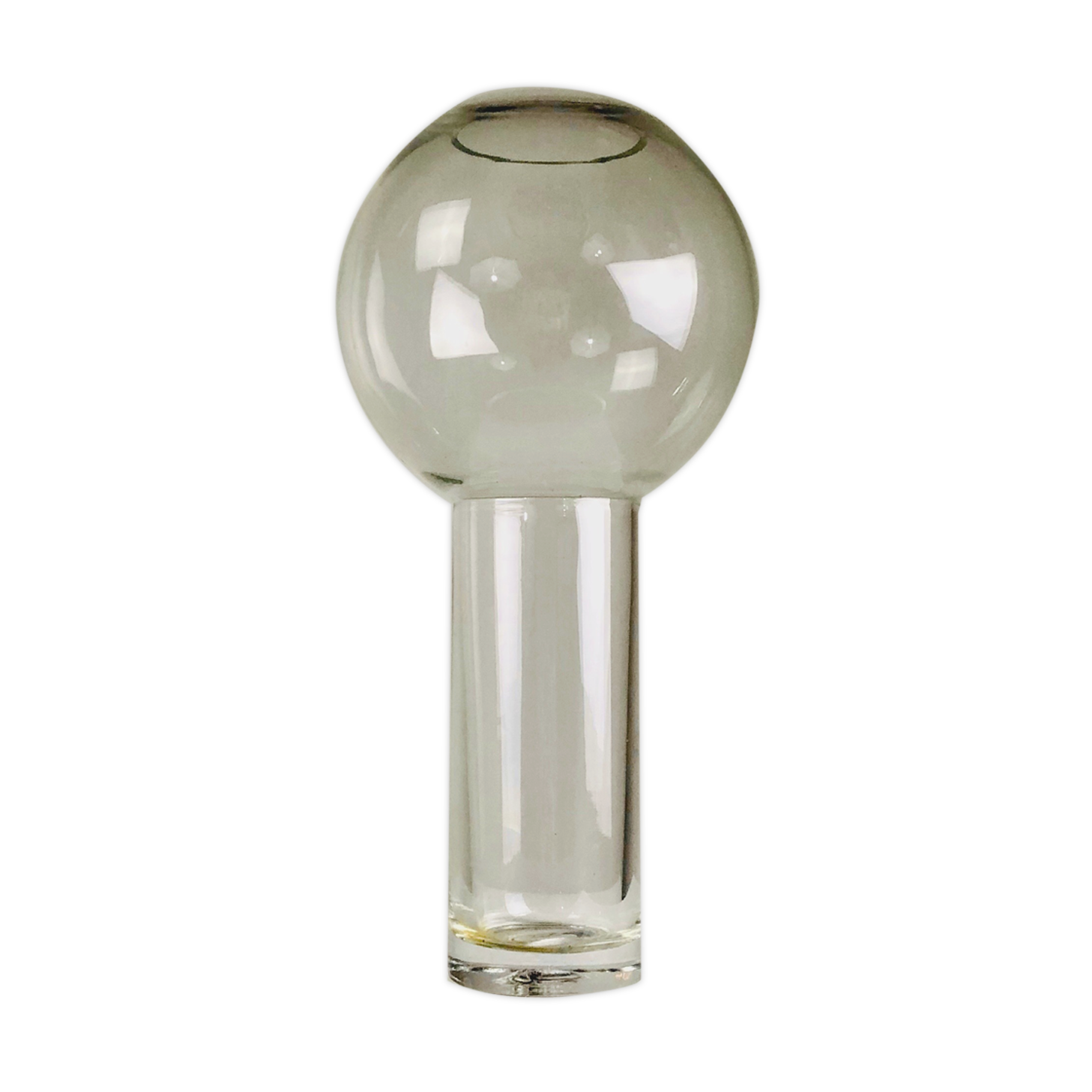 A modernist vase in clear glass.