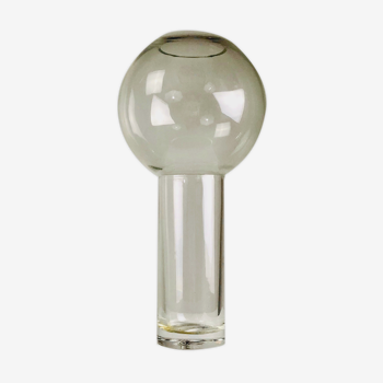 A modernist vase in clear glass.