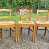 Suite of 9 straw chairs