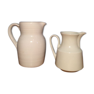 Duo of white pitchers