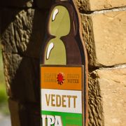 Former advertising wall support for belgian beers vedett ipa - painted wood