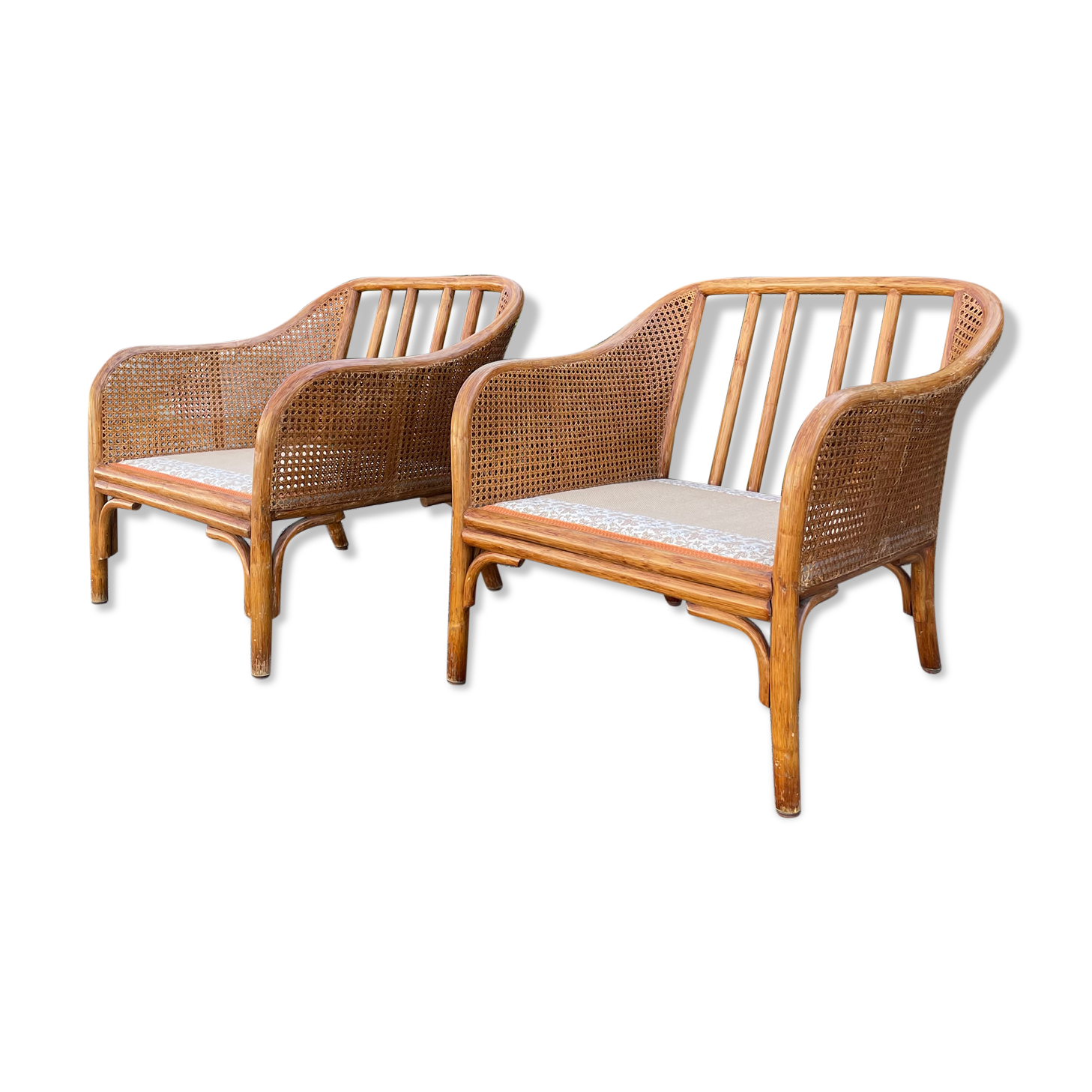 Paire de fauteuils en rotin et cannage