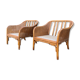 Paire de fauteuils en rotin et cannage