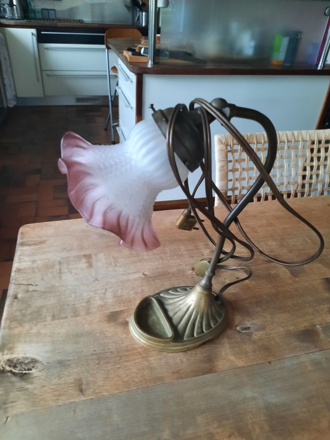 Bronze bedside lamp, pink tulip glass.