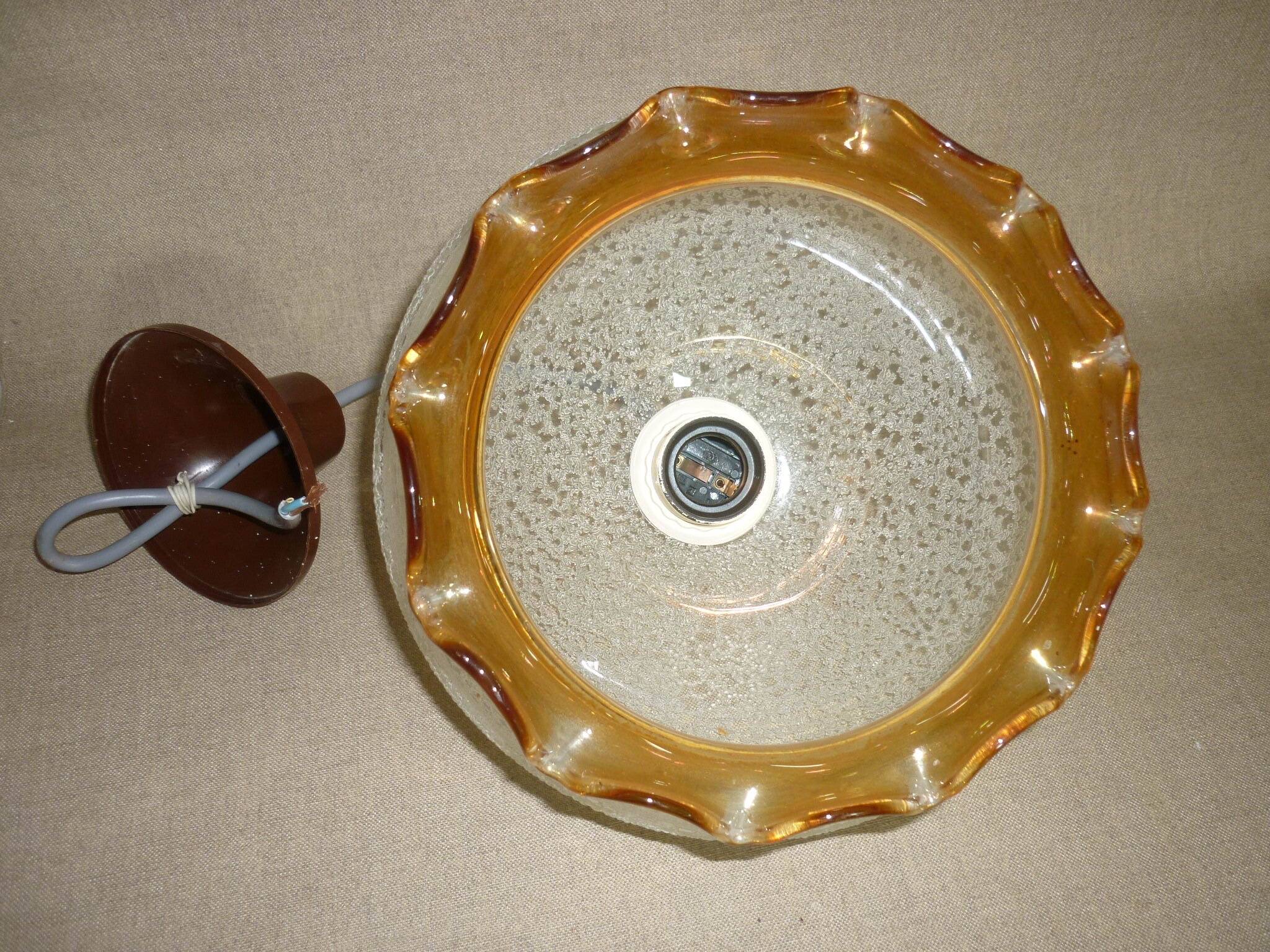 Chandelier in scratched glass and moiré rim