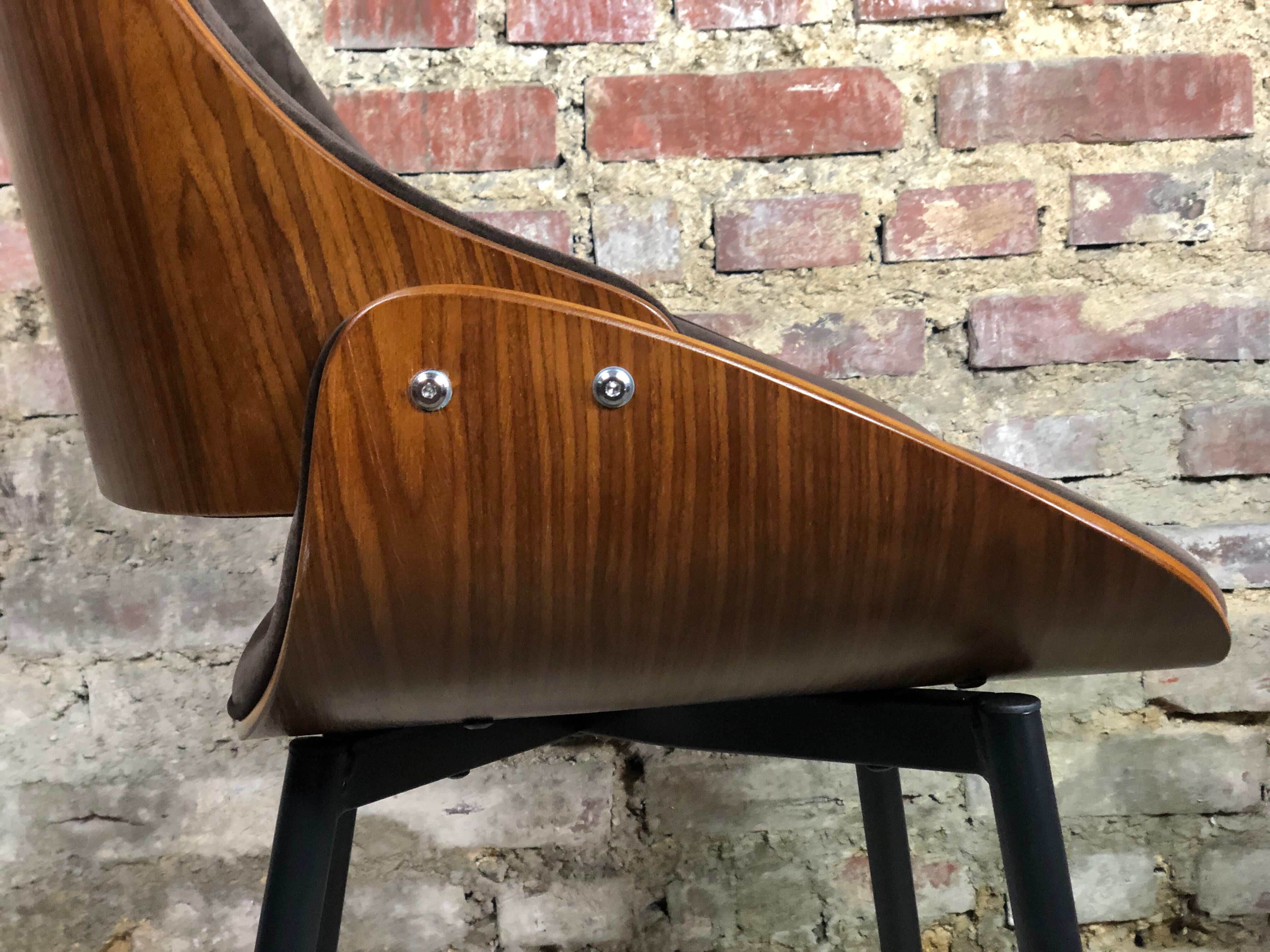 Scandinavian style chairs in curved plywood covered with brown fabric