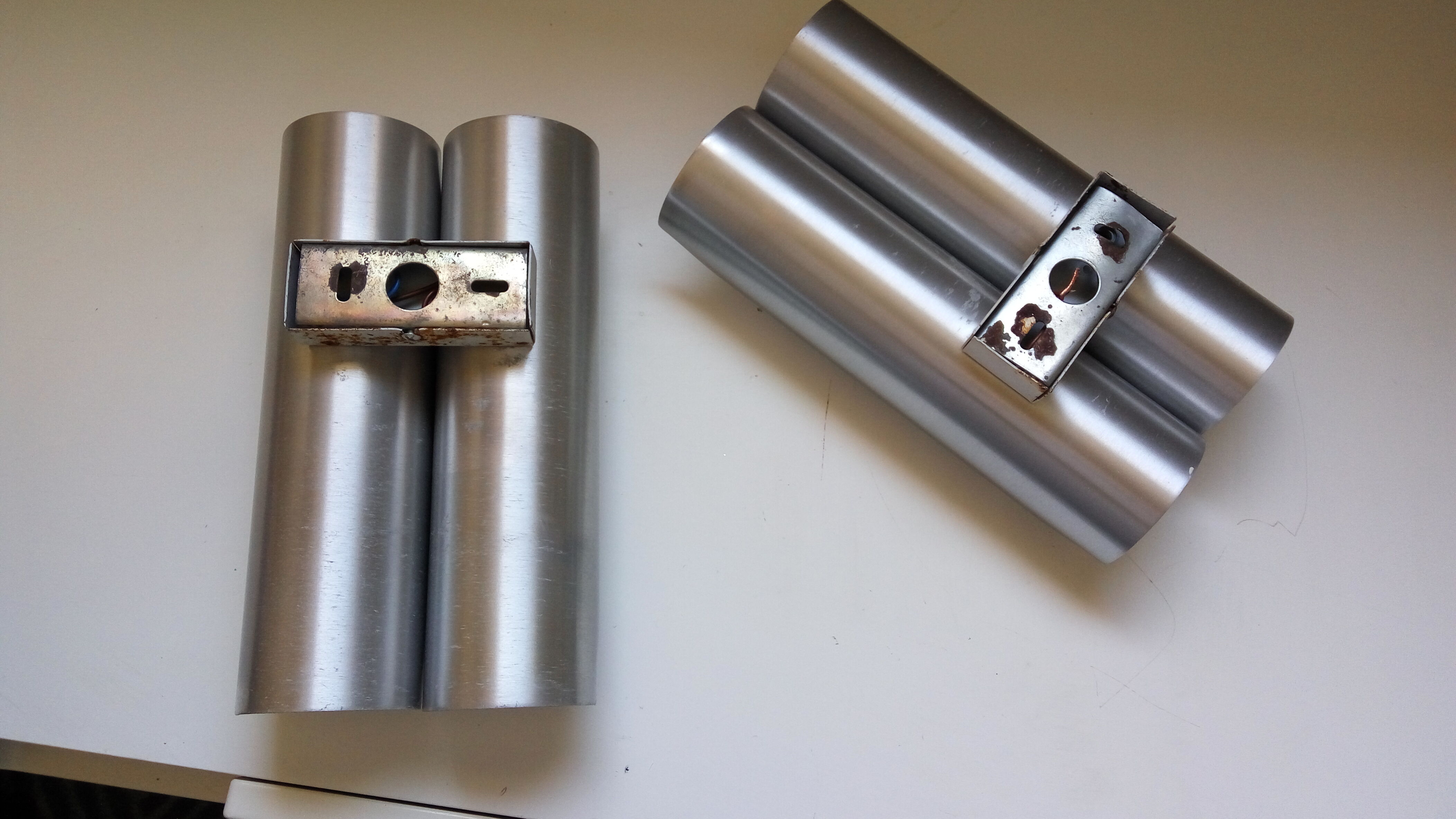 Pair of wall sconces by Fugue Raak