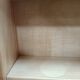 Small wall-mounted bathroom cabinet with vintage mirror doors