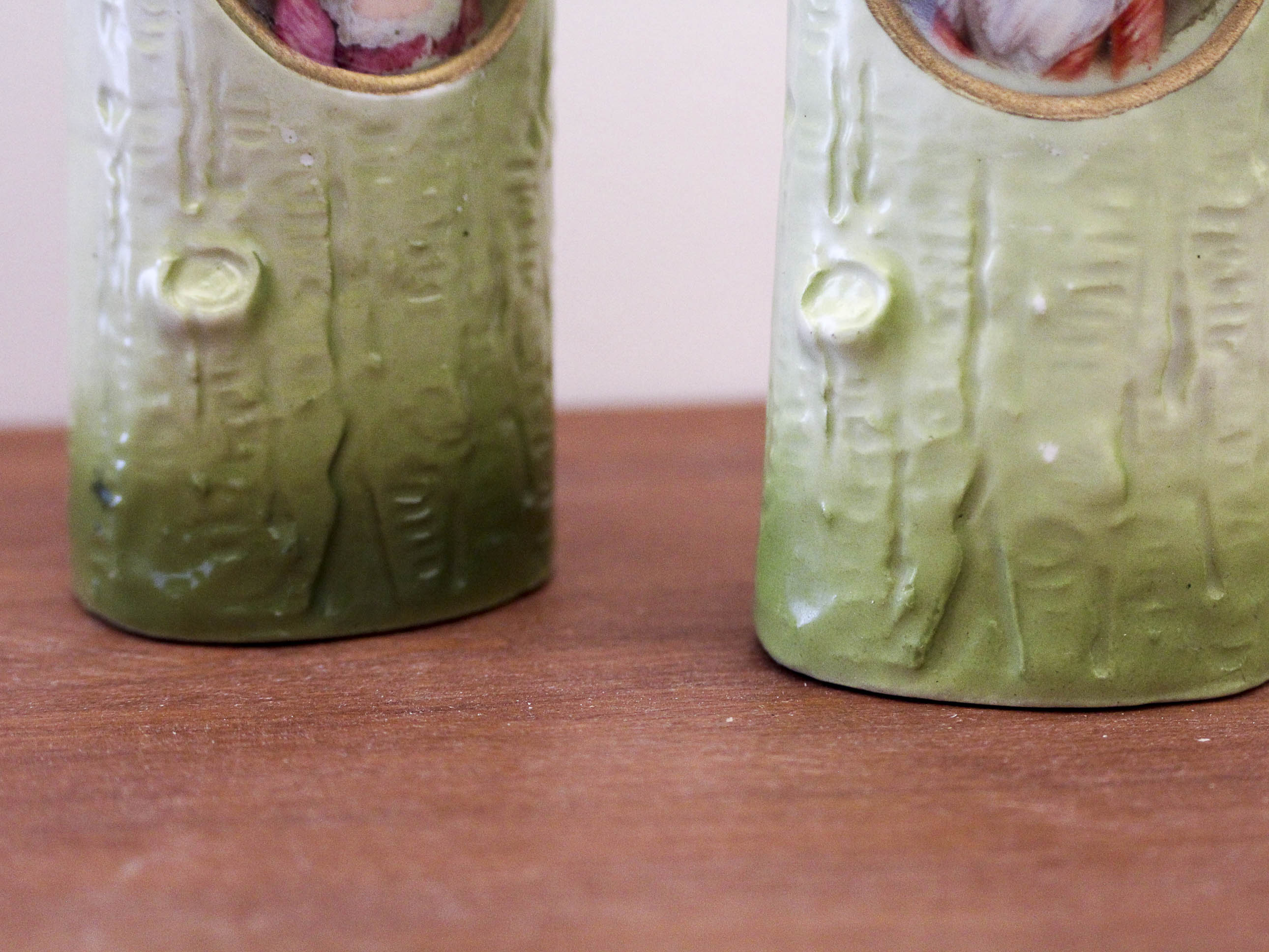 Pair of porcelain vases with portrait decoration of a woman