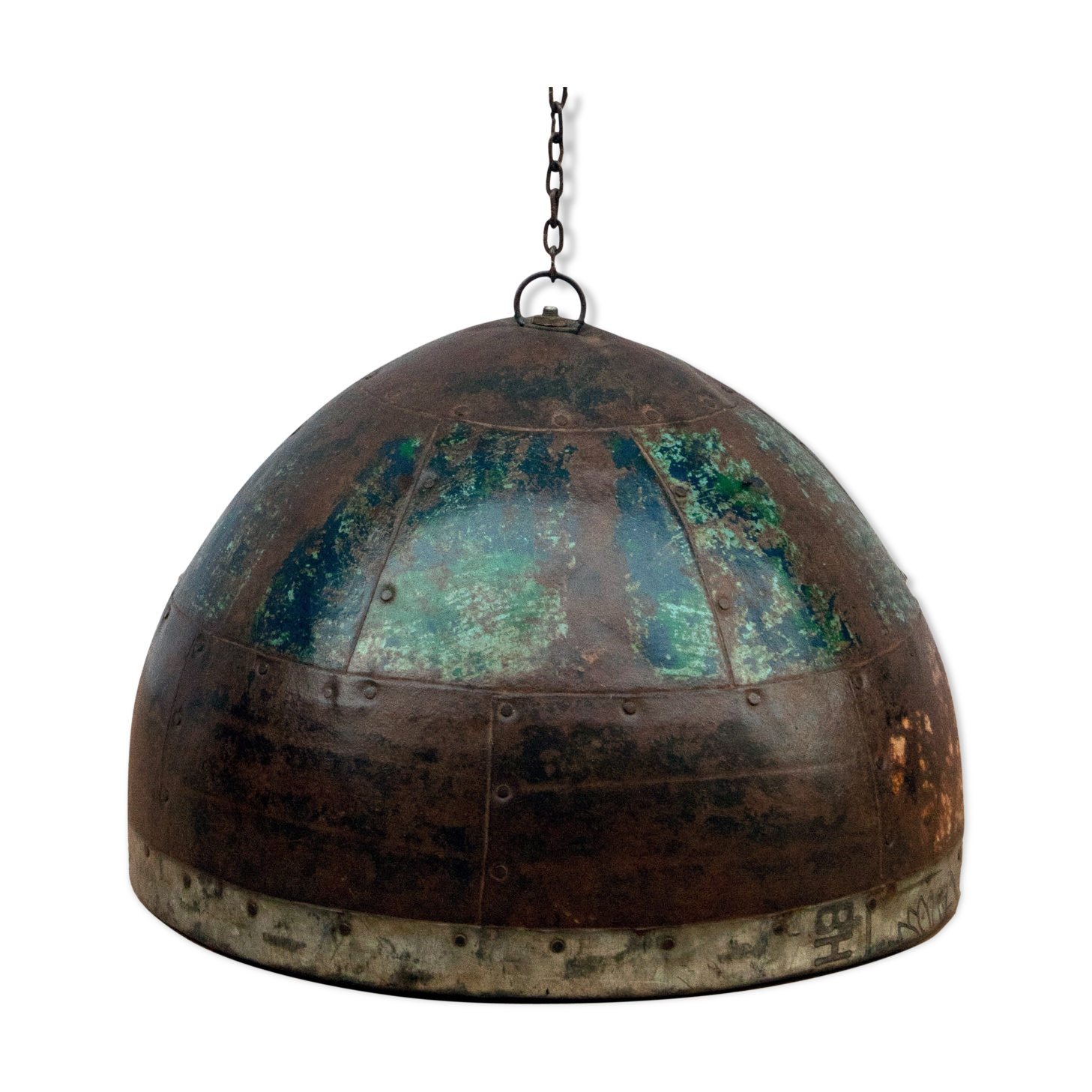 Metal hanging with its original blue-green-rust colour