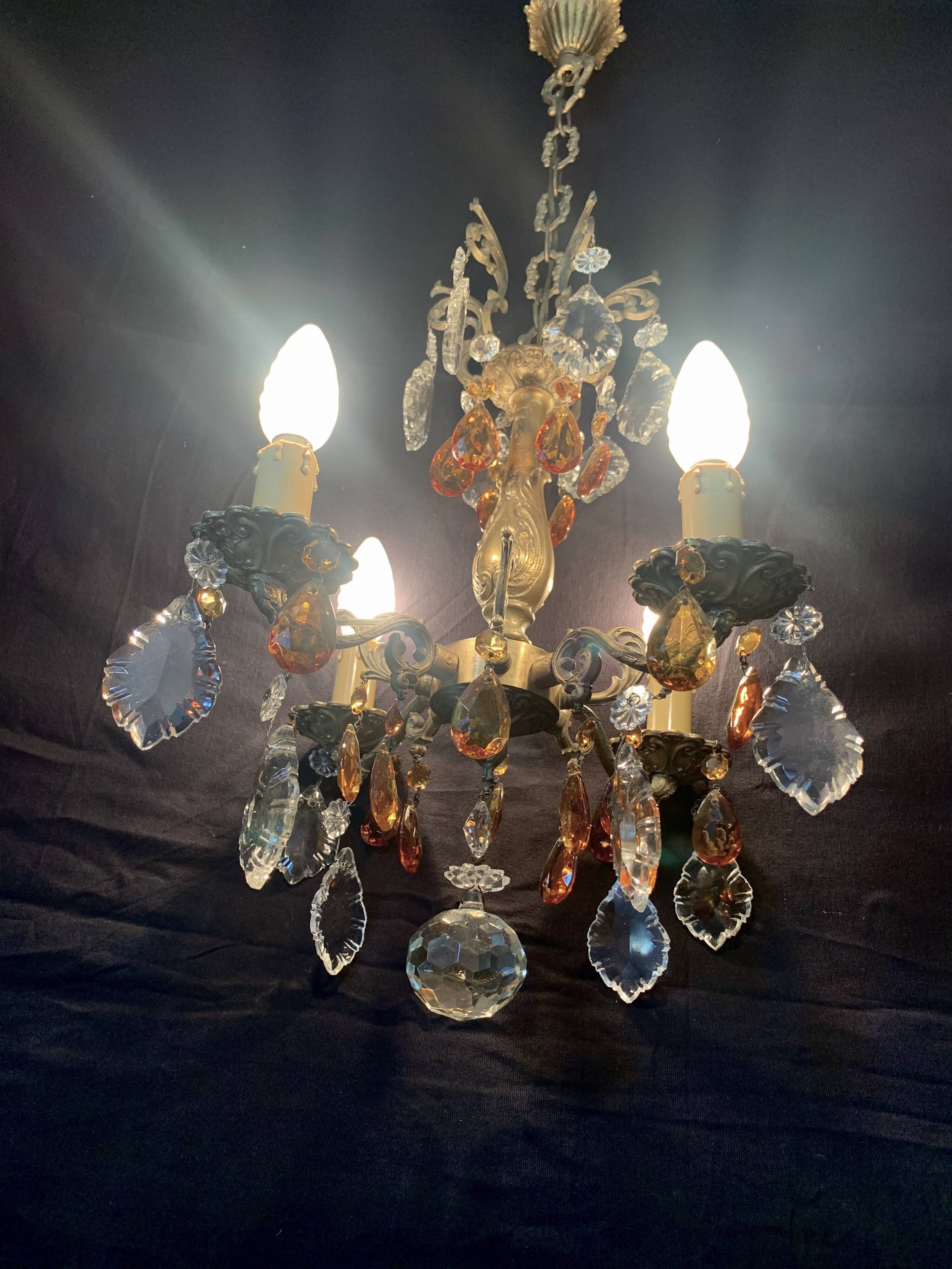 4 bronze lights and tassels chandelier