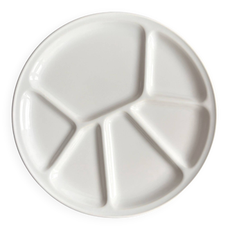 A new white divided plate for appetizers, Germany in the 1970s.