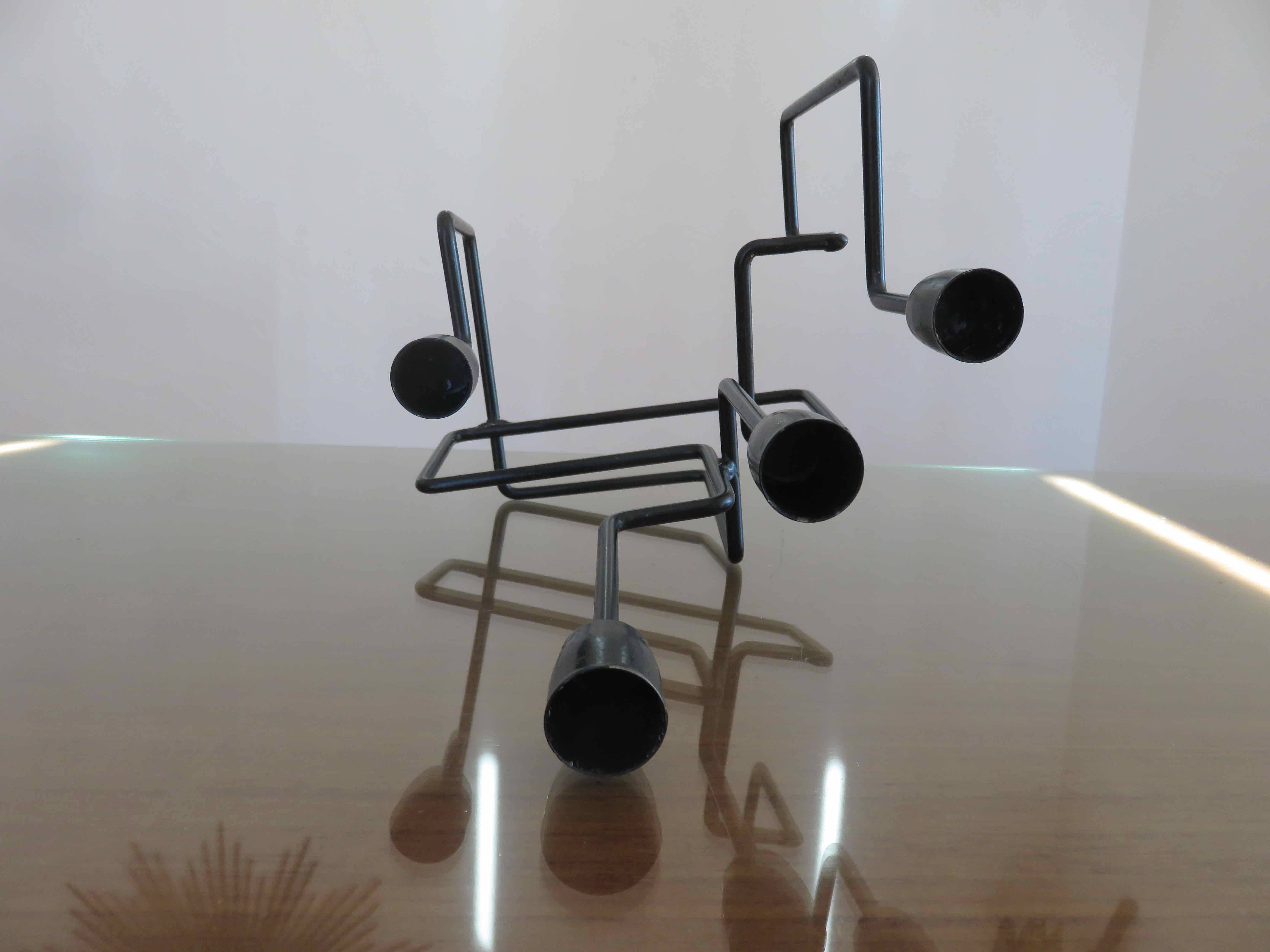 Modernist candle holder in black lacquered metal 1990