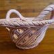 Vintage woven ceramic pocket basket