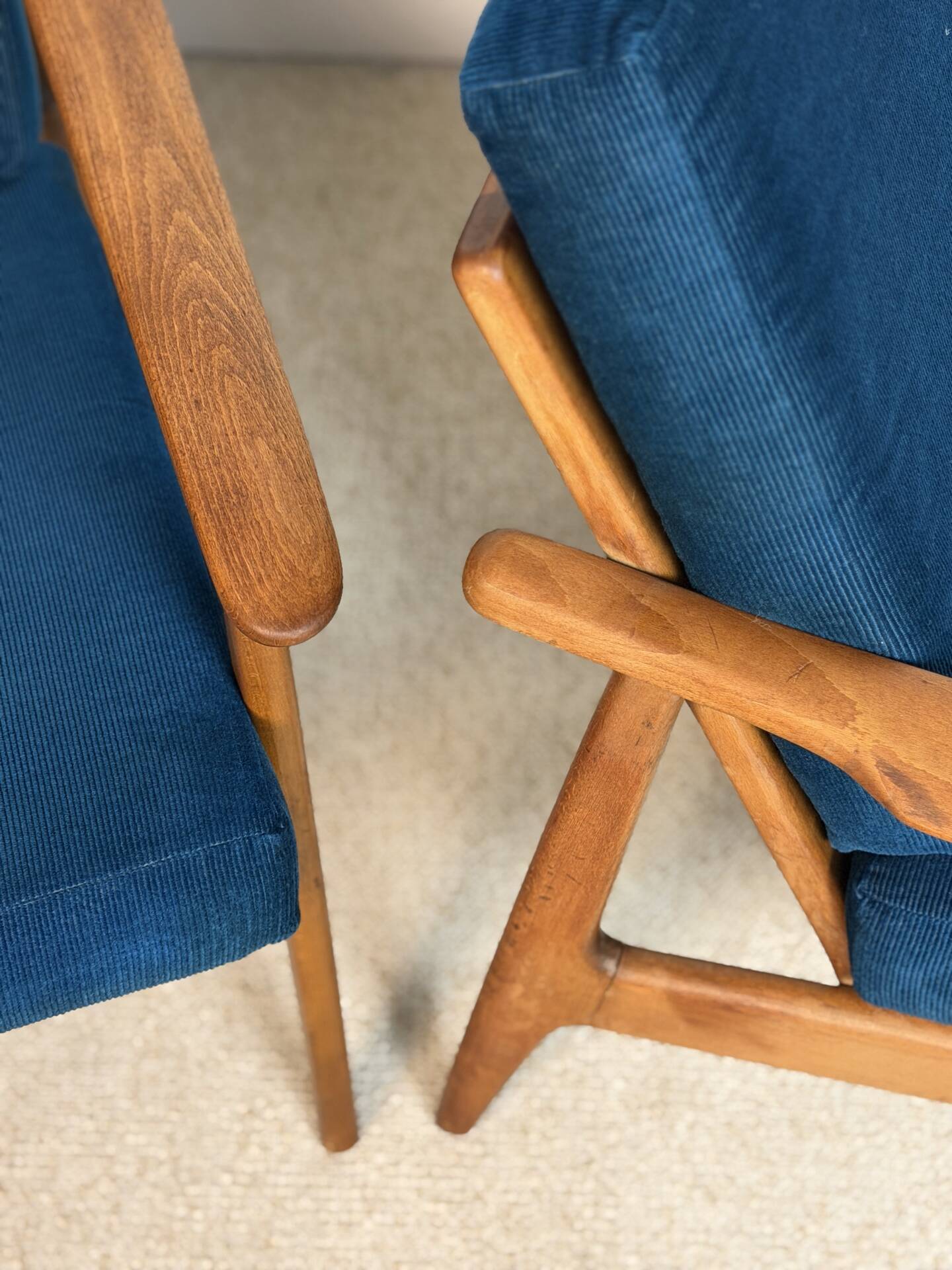 a pair of Scandinavian armchairs in teak from the 1960s