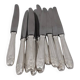 12 dessert, cheese, and hors d'oeuvre knives Grand Prix, Art Deco in silver-plated metal.