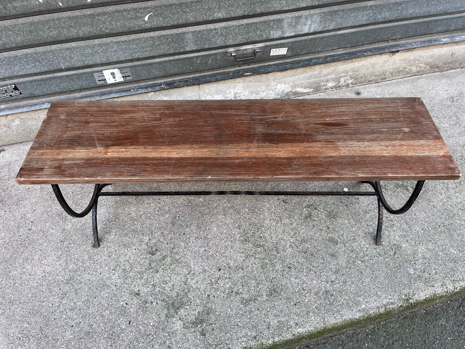 Rustic oak wrought iron bench