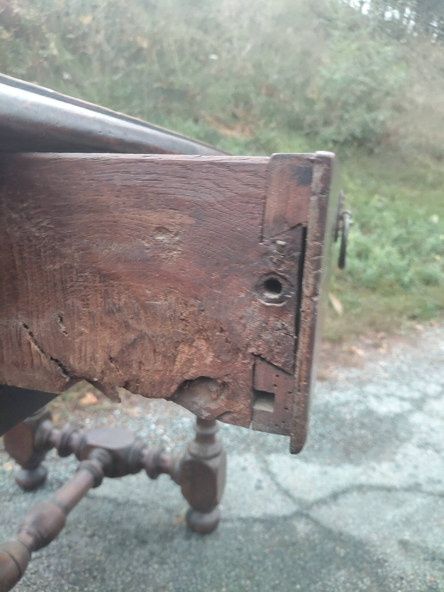 Small antique writing table in Louis XIII style made of oak.