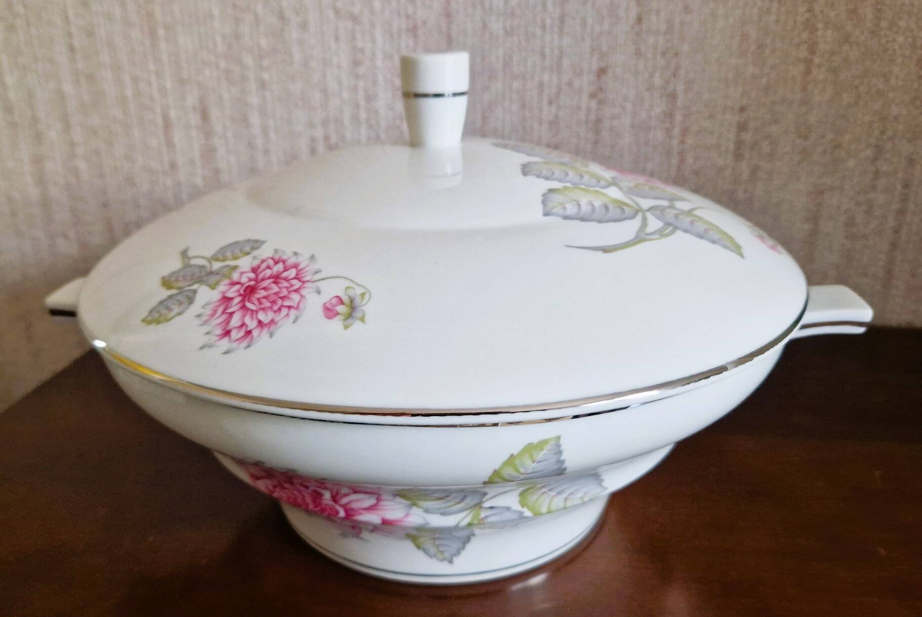 White porcelain soup tureen by Haviland with Dahlia patterns.