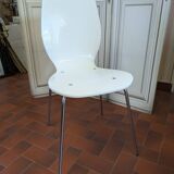 White plexiglass chair
